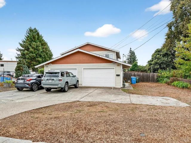 a car parked in front of a house
