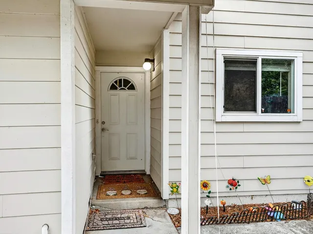 a view of a door and a window