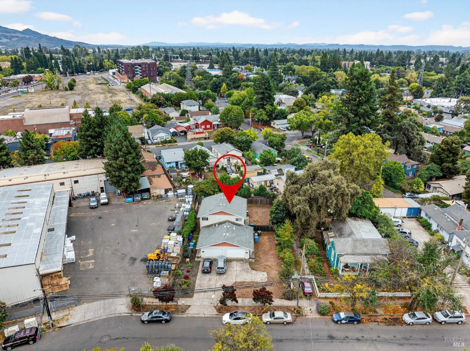 100-102 West 8th Street Santa Rosa, CA 95401 - Photo 31 of 32 an aerial view of residential houses with outdoor space and parking