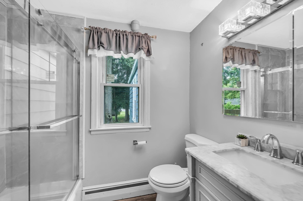 23 Gatewood Road Springfield, MA 01119 - Photo 21 of 31 a bathroom with a granite countertop sink toilet and shower