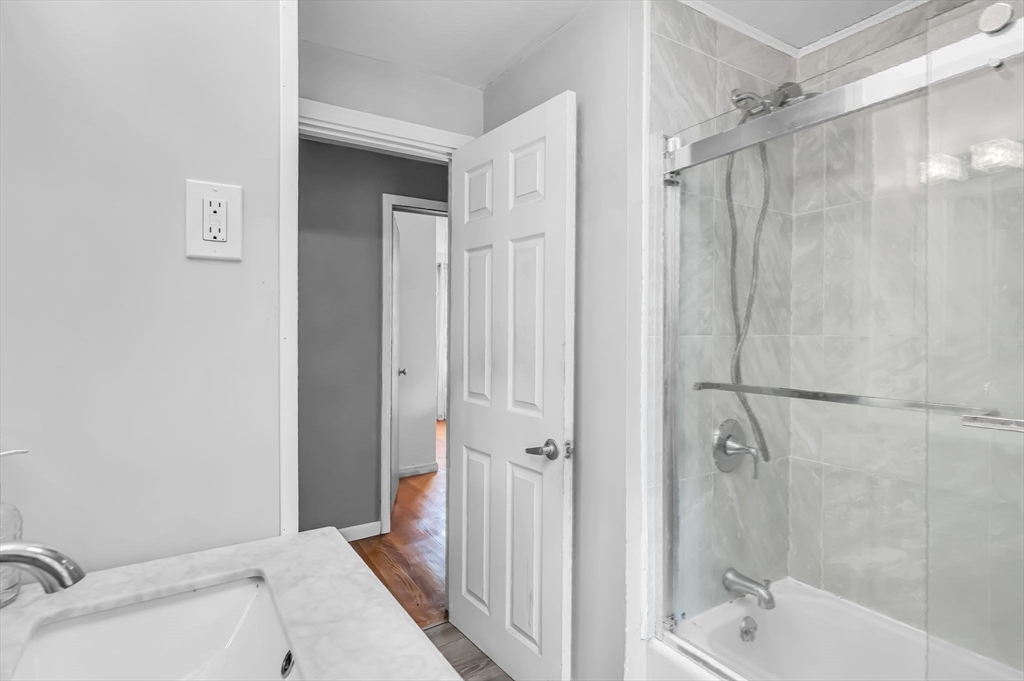 23 Gatewood Road Springfield, MA 01119 - Photo 22 of 31 a bathroom with a sink and a shower