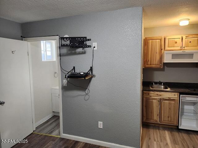 1145-1155 Cornell Avenue, Unit VARIOUS Lovelock, NV 89419 - Photo 6 of 7 a kitchen with a refrigerator and a stove