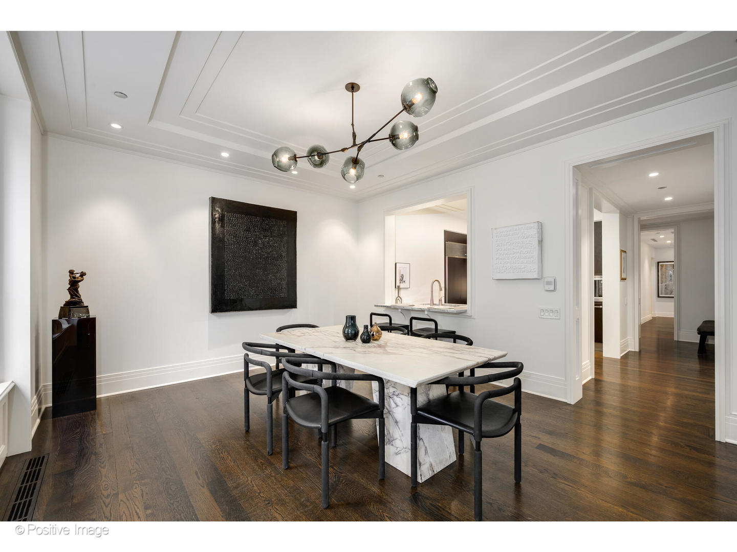 159 East Walton Place, Unit 7G Chicago, IL 60611 - Photo 12 of 37 a view of a dining room with furniture and wooden floor
