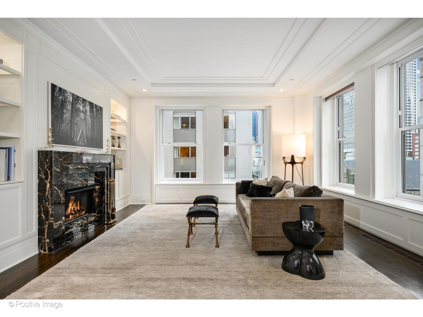 159 East Walton Place, Unit 7G Chicago, IL 60611 - Photo 6 of 37 a living room with furniture and a fireplace