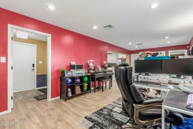 a room with furniture and a flat screen tv