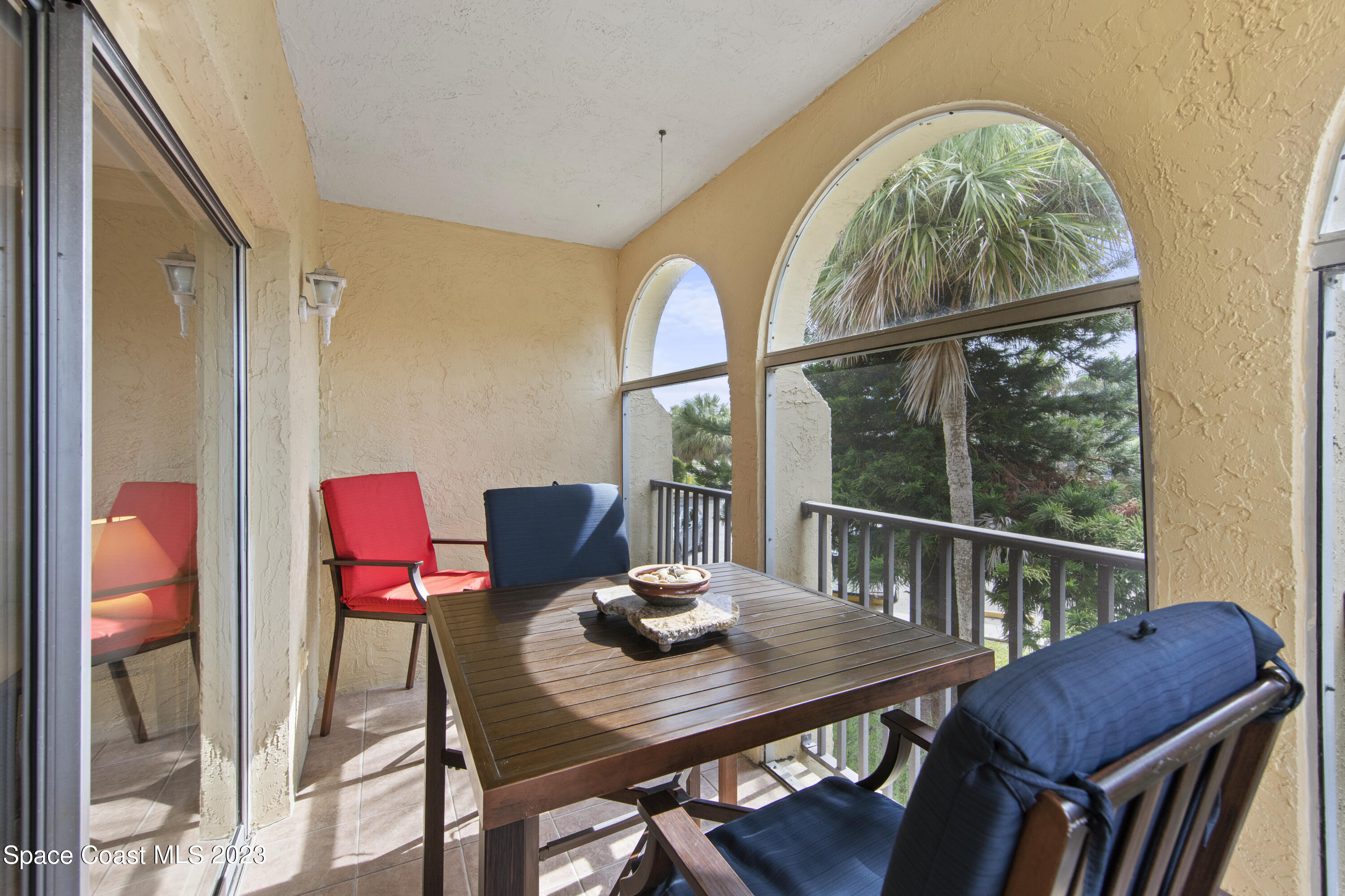 4150 Florida A1A, Unit 104 Vero Beach, FL 32963 - Photo 23 of 30 a view of a dining room with furniture window and outside view