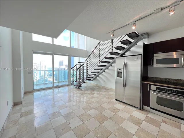 a view of an empty room with a stove