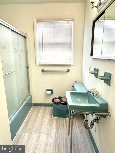 6936 Blanche Road Baltimore, MD 21215 - Photo 13 of 15 a room with a table and a window