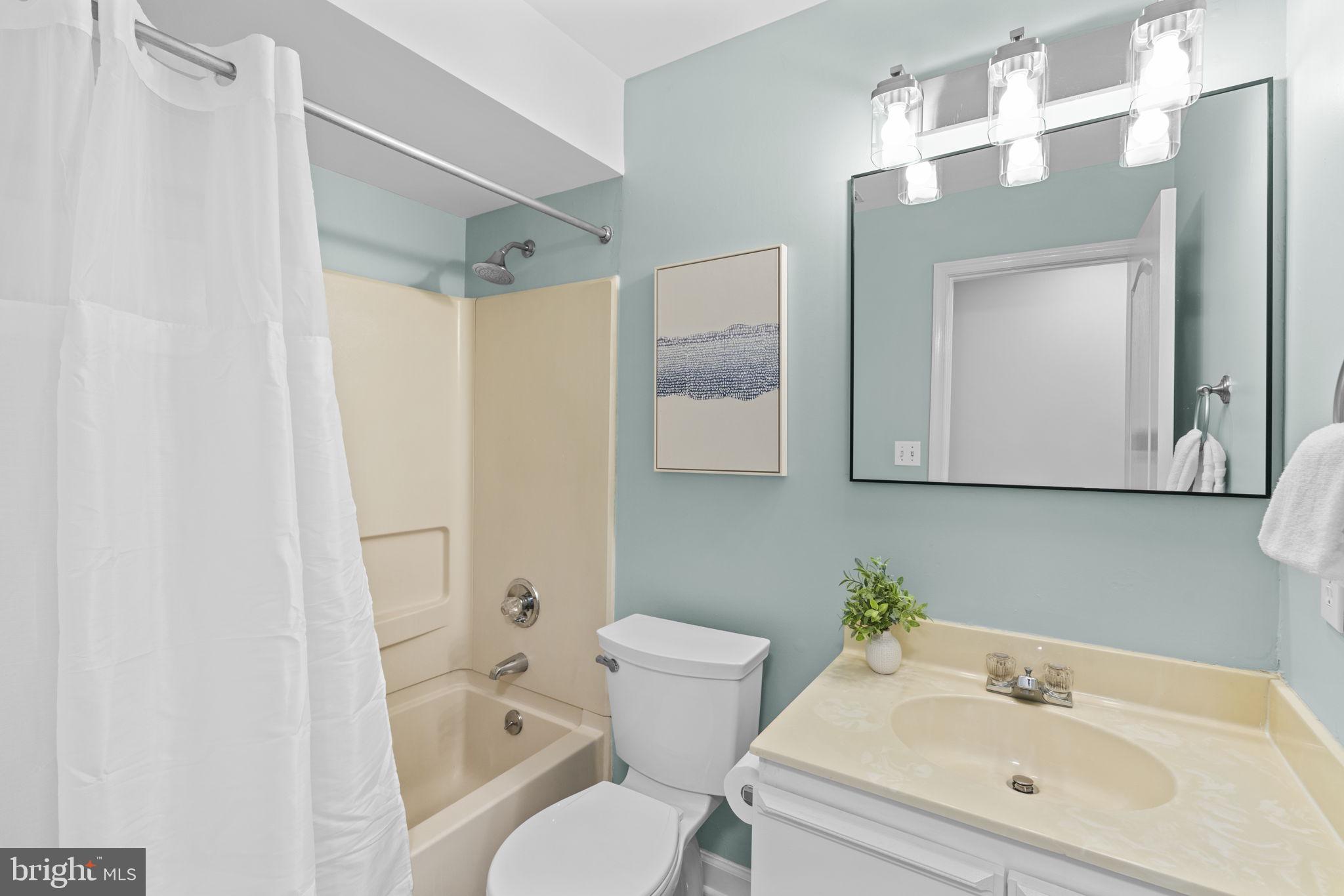 8513 Falls Run Road, Unit D Ellicott City, MD 21043 - Photo 18 of 22 Updated hall bathroom with tub shower