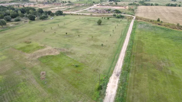 a view of a golf course with a lake