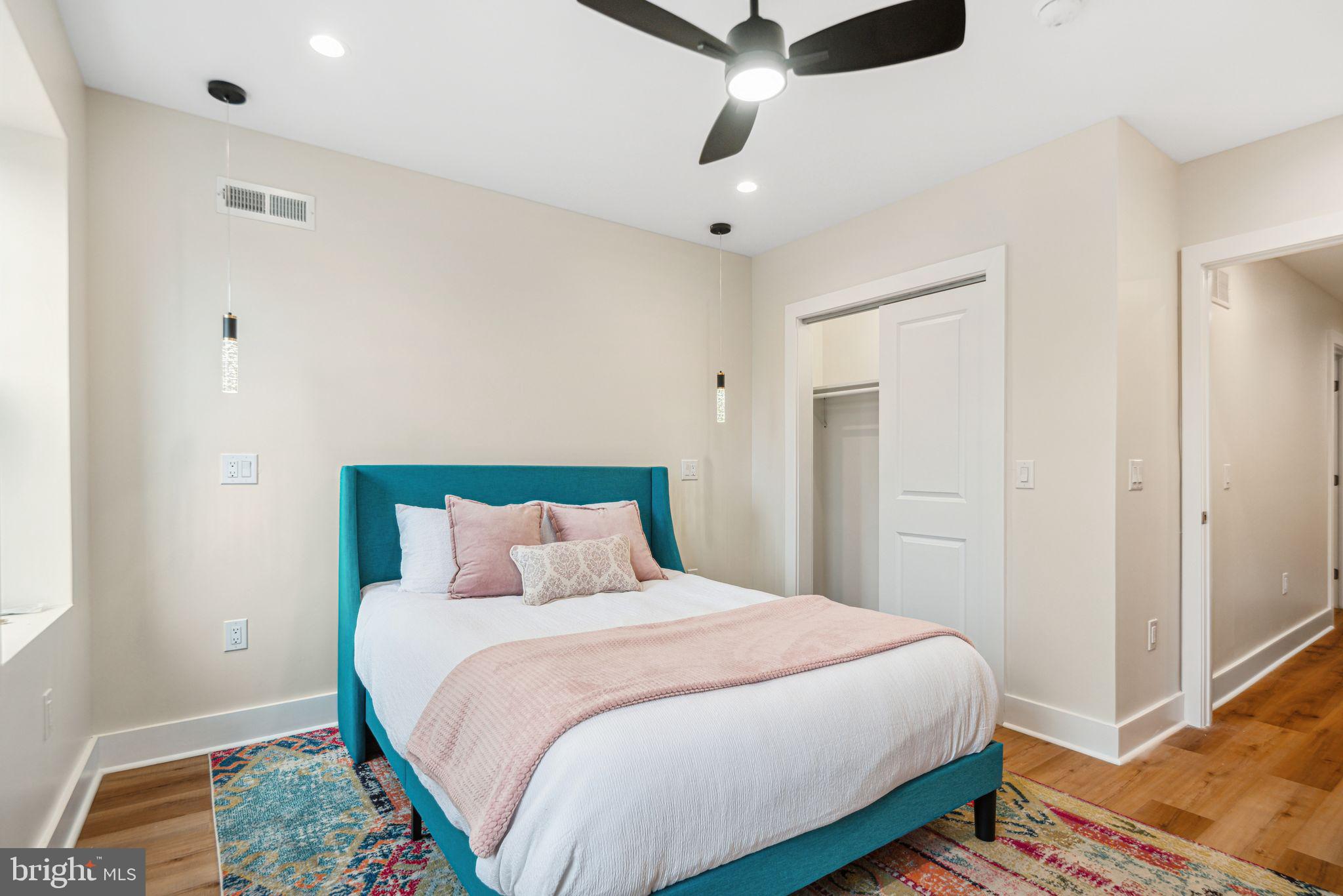 1812 East Letterly Street Philadelphia, PA 19125 - Photo 18 of 26 a bedroom with a bed and a rug