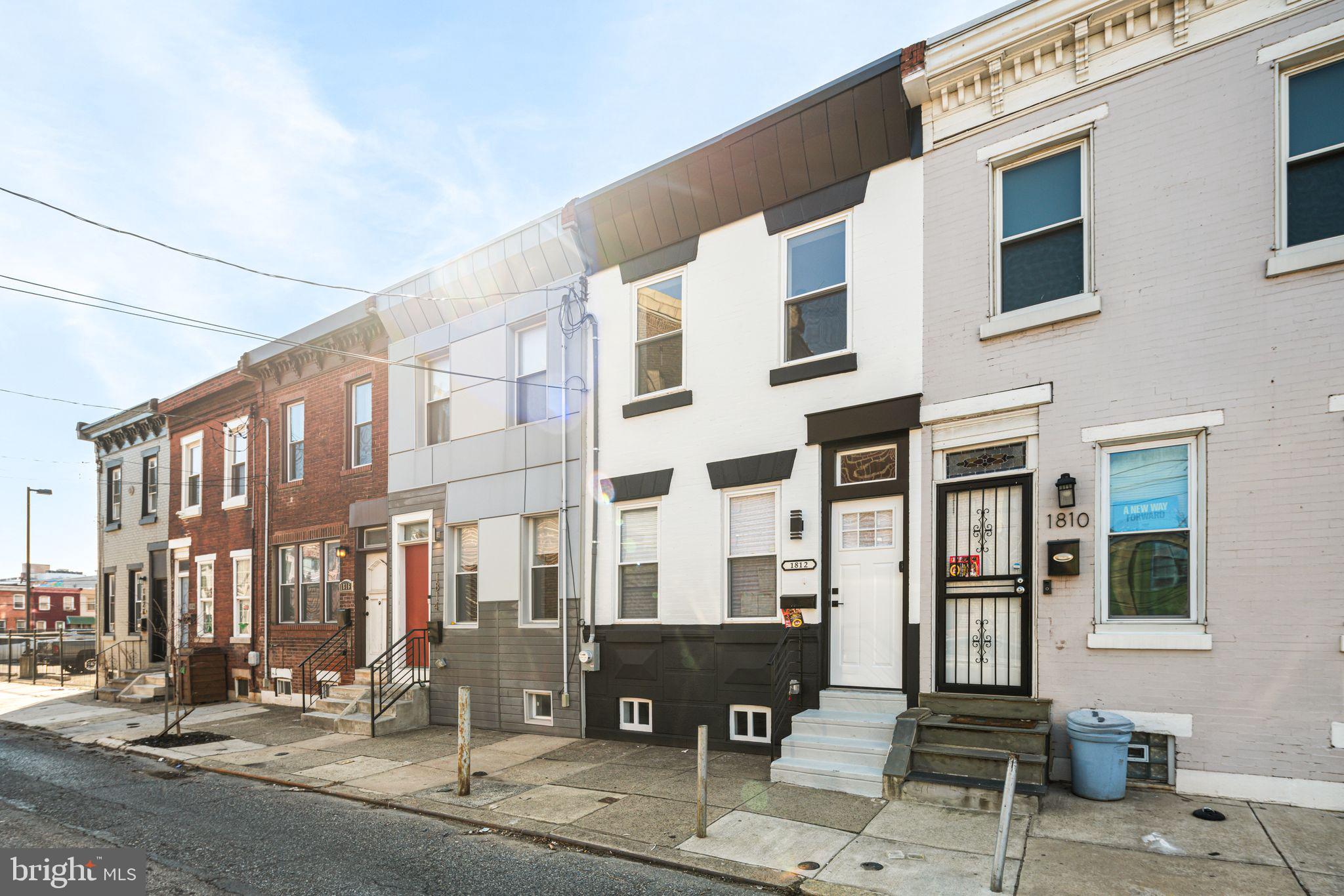 1812 East Letterly Street Philadelphia, PA 19125 - Photo 2 of 26 a front view of a building with street