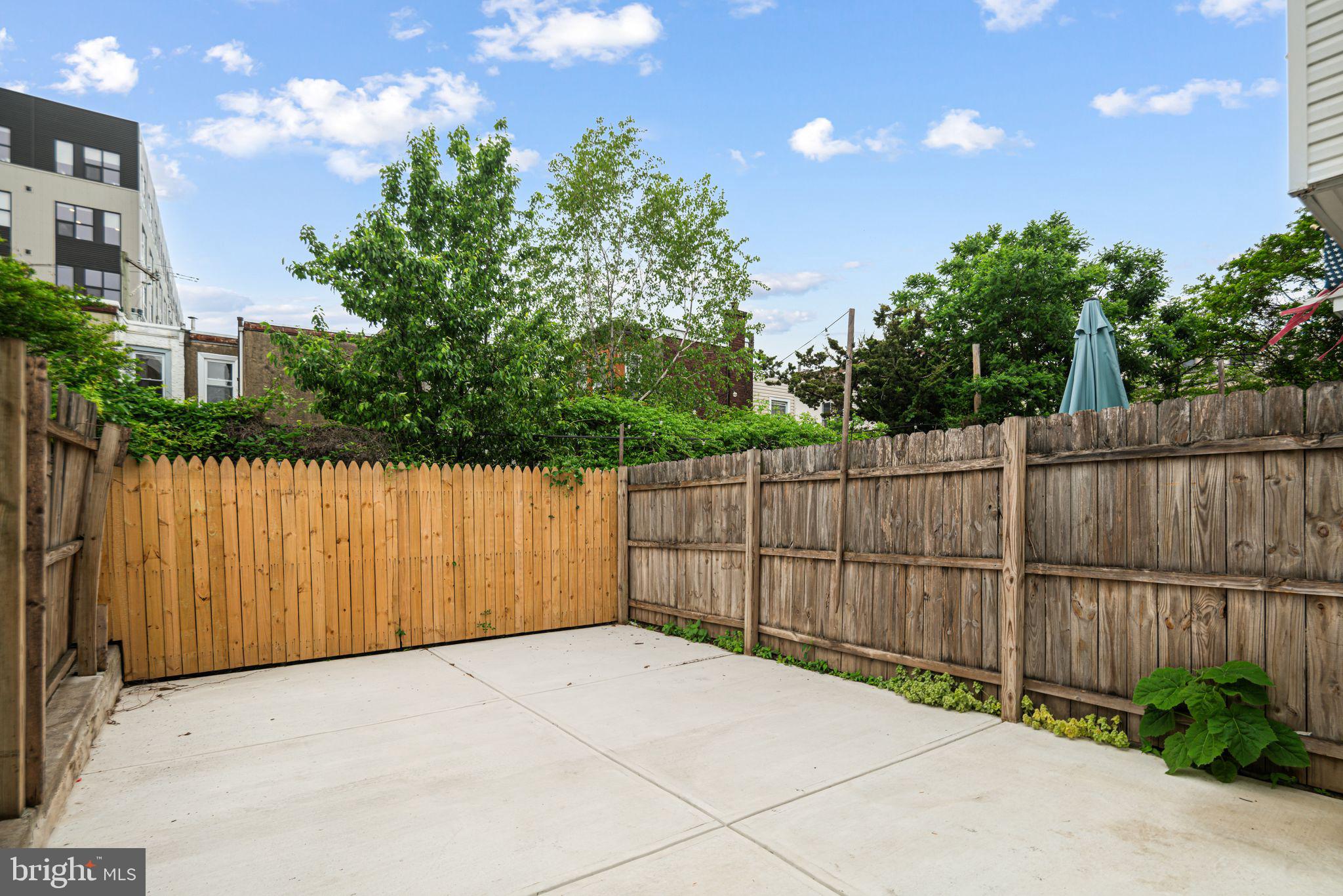 1812 East Letterly Street Philadelphia, PA 19125 - Photo 24 of 26 a view of backyard and wooden fence