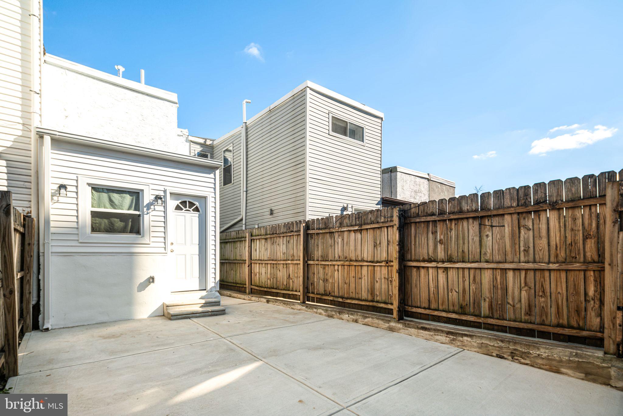 1812 East Letterly Street Philadelphia, PA 19125 - Photo 25 of 26 a view of a house with wooden fence