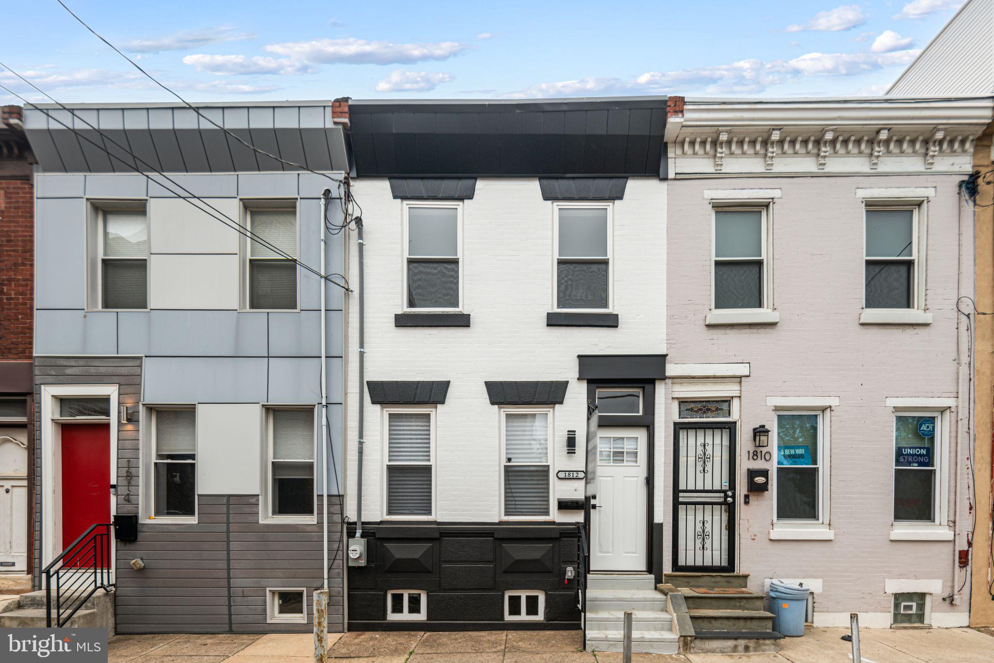 1812 East Letterly Street Philadelphia, PA 19125 - Photo 26 of 26 a large building with a lot of windows
