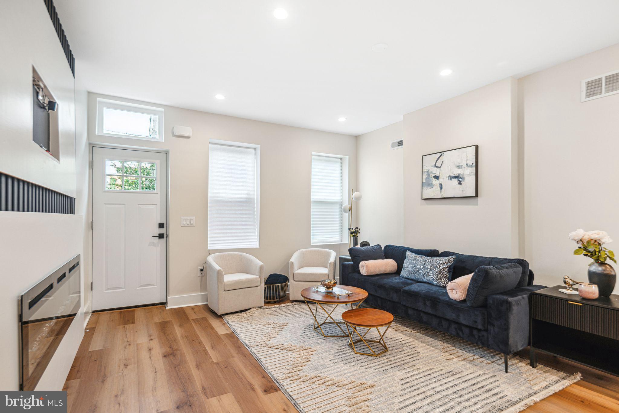 1812 East Letterly Street Philadelphia, PA 19125 - Photo 3 of 26 a living room with furniture and wooden floor