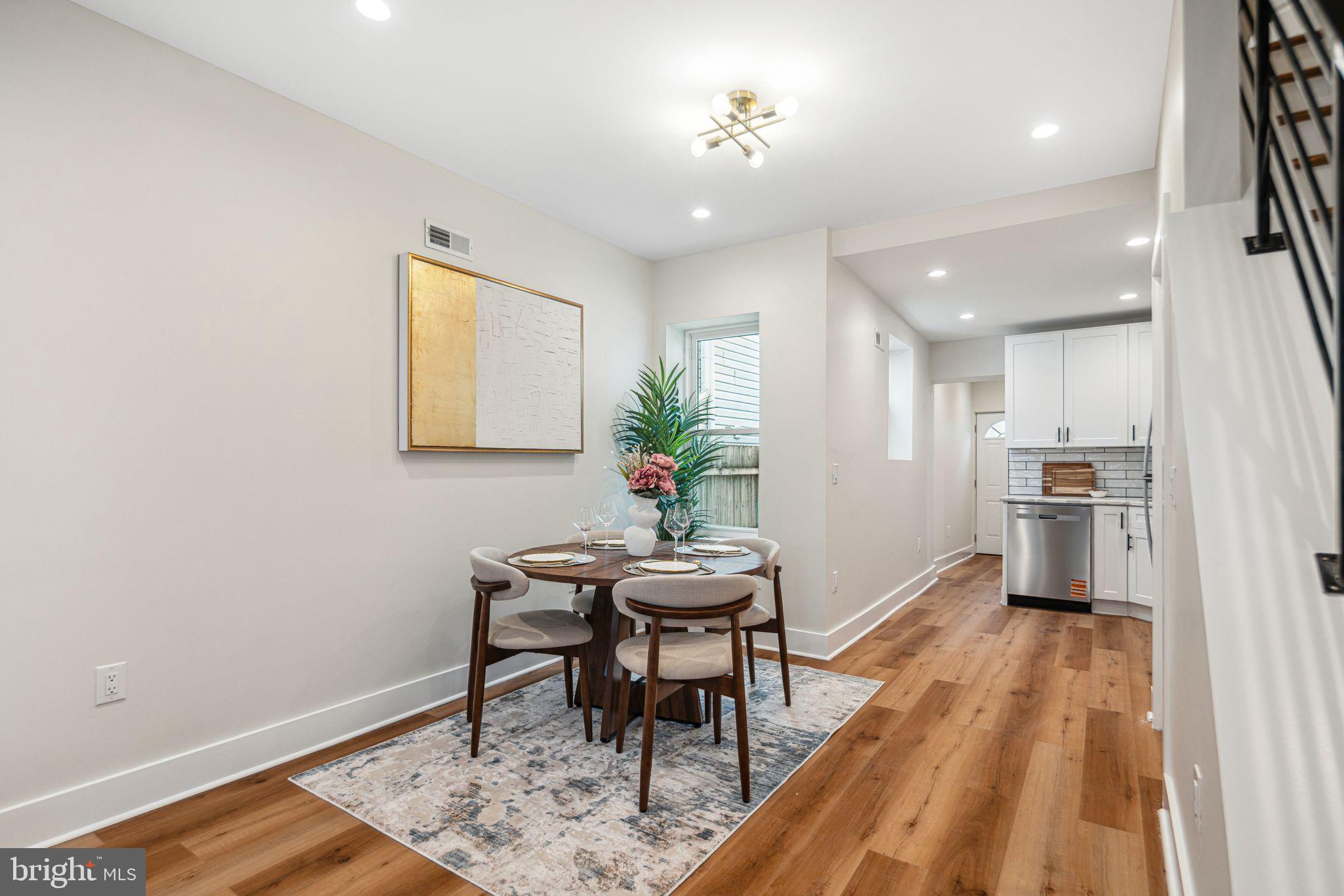 1812 East Letterly Street Philadelphia, PA 19125 - Photo 5 of 26 a view of a dining room with furniture and wooden floor