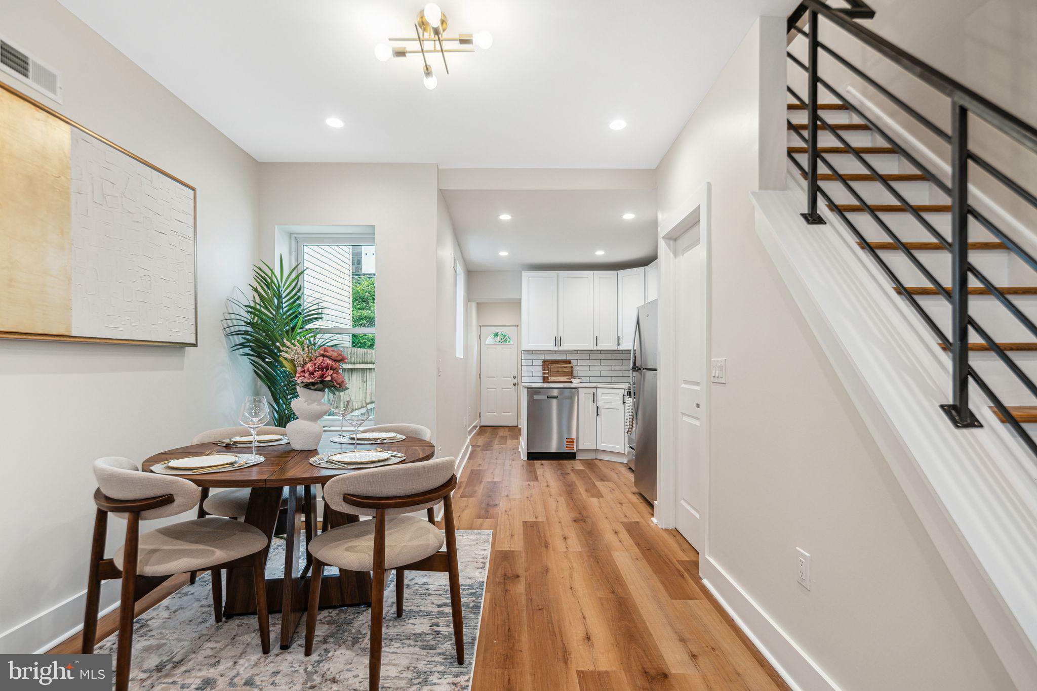 1812 East Letterly Street Philadelphia, PA 19125 - Photo 6 of 26 a view of a dining room with furniture and wooden floor