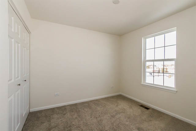 2949 Madison Drive Naperville, IL 60564 - Photo 21 of 29 an empty room with a window