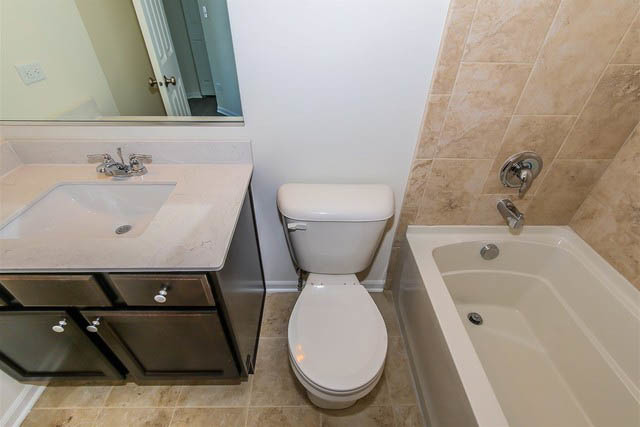 2949 Madison Drive Naperville, IL 60564 - Photo 26 of 29 a bathroom with a sink and toilet