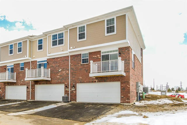 2949 Madison Drive Naperville, IL 60564 - Photo 29 of 29 a front view of a building with a road