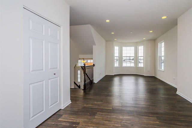 2949 Madison Drive Naperville, IL 60564 - Photo 8 of 29 a view of empty room with wooden floor and fan