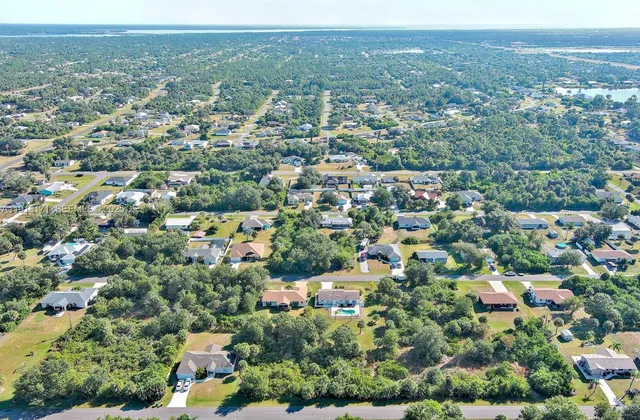 an aerial view of a city with lots of residential buildings
