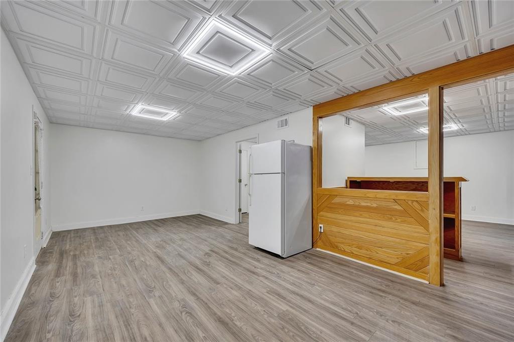 635 Anderson Walk Marietta, GA 30062 - Photo 28 of 39 a view of empty room with wooden floor