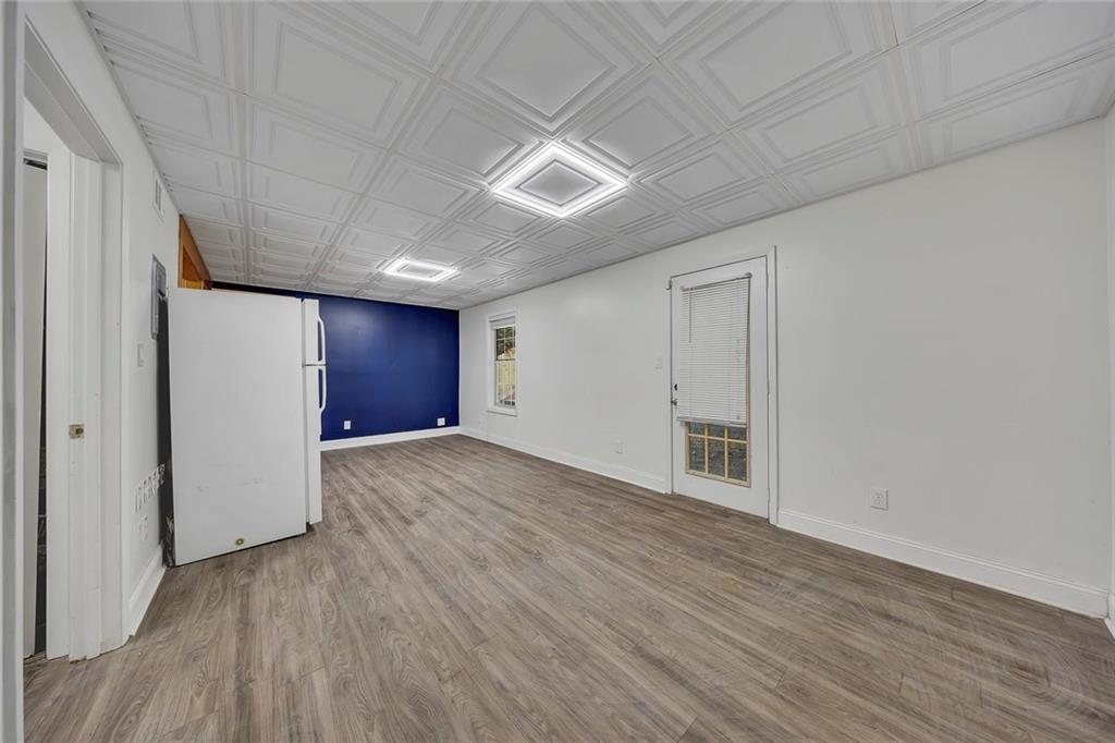 635 Anderson Walk Marietta, GA 30062 - Photo 29 of 39 a view of an empty room with wooden floor