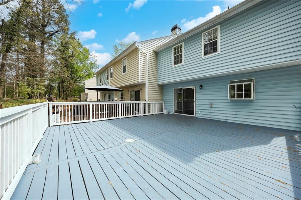 635 Anderson Walk Marietta, GA 30062 - Photo 33 of 39 a view of a house with wooden deck