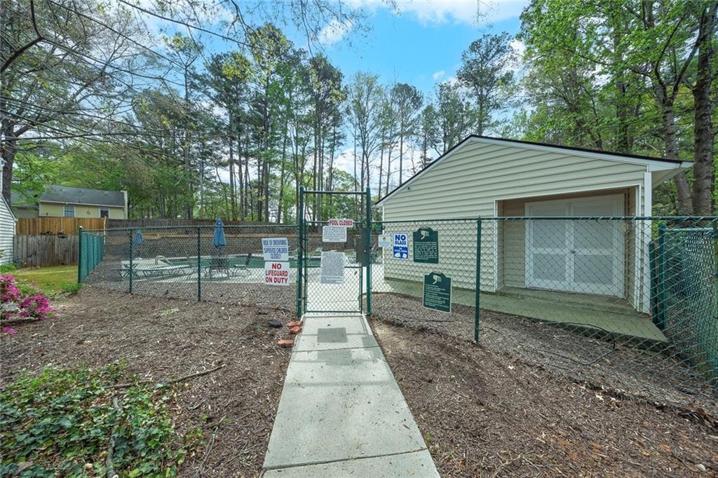 635 Anderson Walk Marietta, GA 30062 - Photo 37 of 39 a backyard of a house with lots of green space