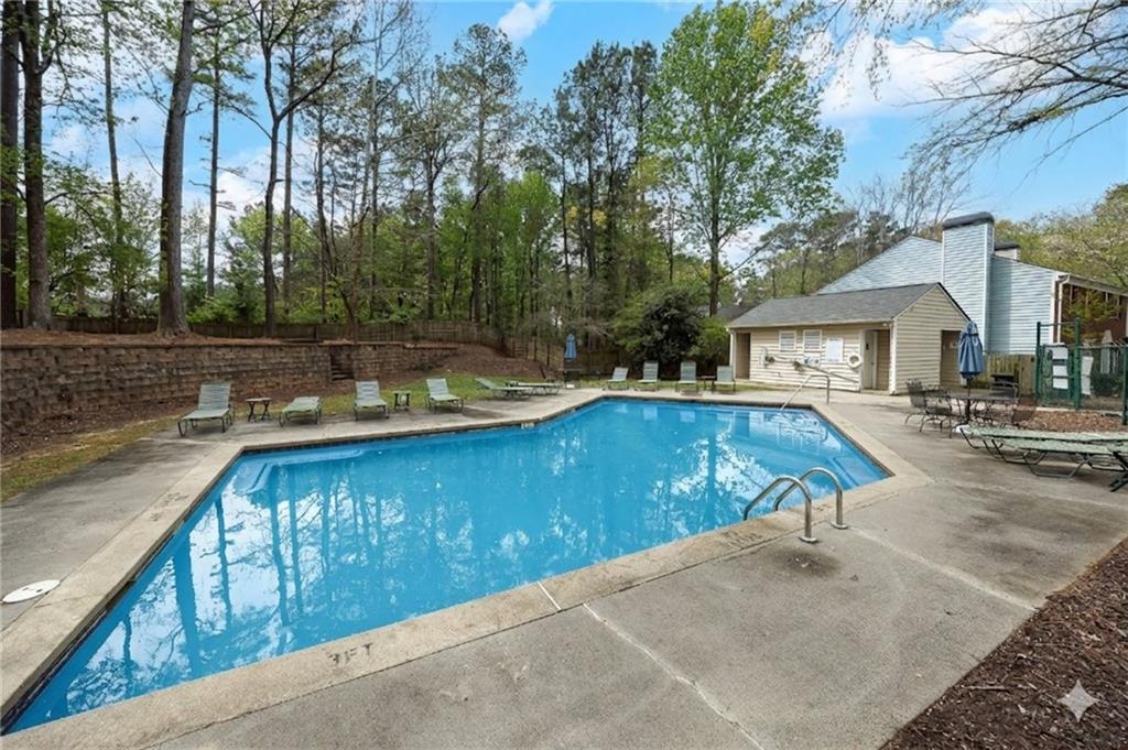 635 Anderson Walk Marietta, GA 30062 - Photo 39 of 39 a view of swimming pool with outdoor seating