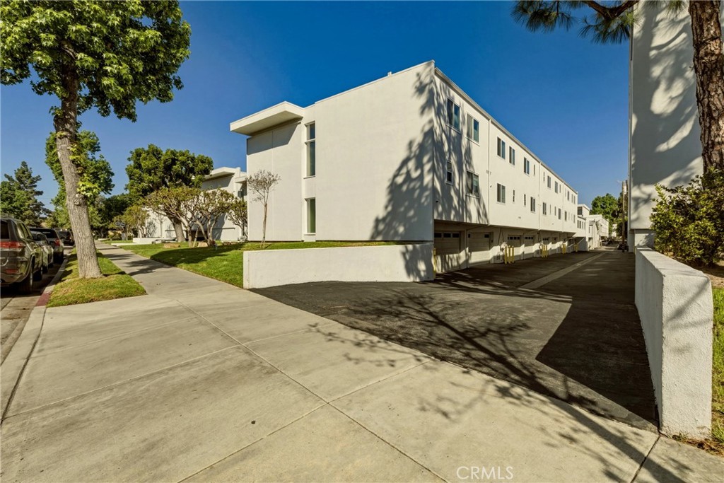4331 West Sarah Street, Unit 10 Burbank, CA 91505 - Photo 2 of 26 a view of a street with house