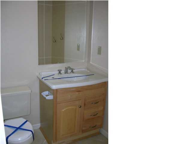 104 Beacon''s Bend Road Crestview, FL 32536 - Photo 19 of 26 a bathroom with a sink and a mirror
