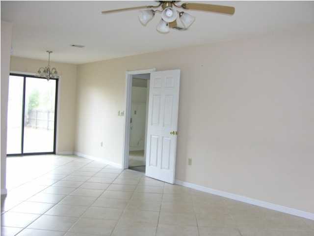104 Beacon''s Bend Road Crestview, FL 32536 - Photo 3 of 26 a view of an empty room with a window