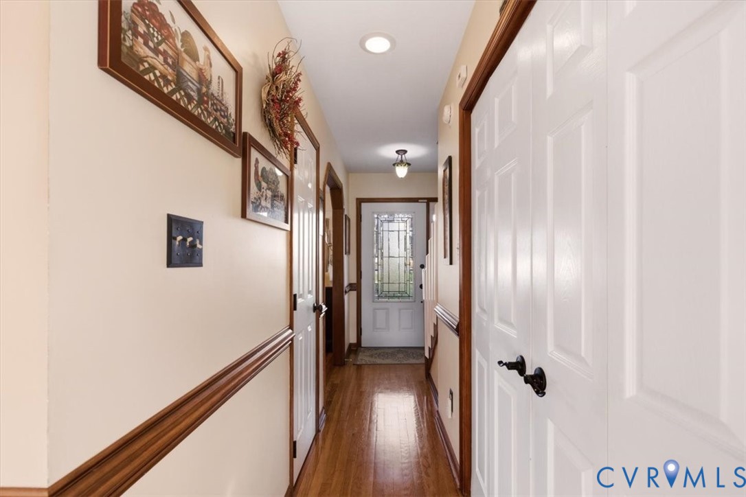 2604 Brookforest Terrace Midlothian, VA 23112 - Photo 19 of 49 a view of a hallway with wooden floor and staircase
