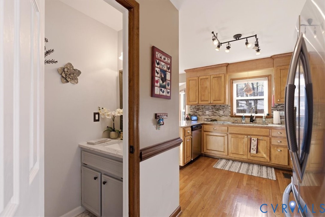 2604 Brookforest Terrace Midlothian, VA 23112 - Photo 20 of 49 a kitchen with a refrigerator and a sink