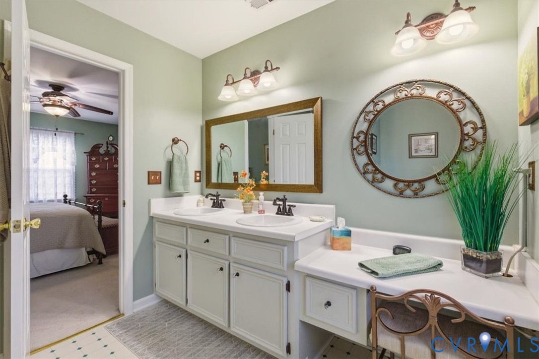 2604 Brookforest Terrace Midlothian, VA 23112 - Photo 29 of 49 a bathroom with a sink and a mirror