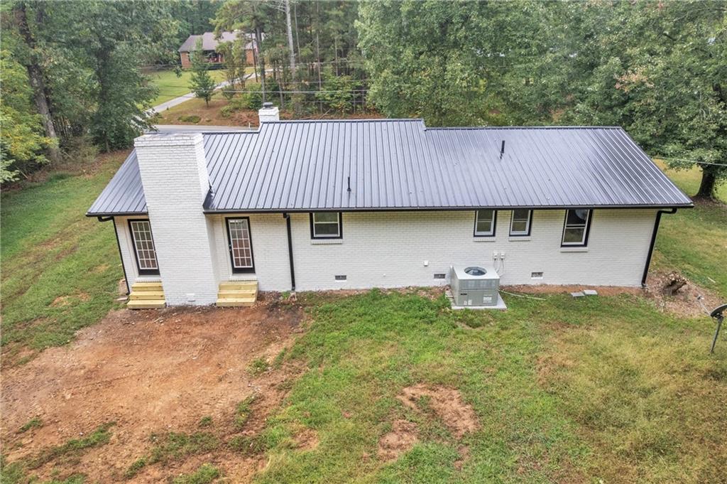 199 McKaskey Creek Road Southeast Cartersville, GA 30121 - Photo 32 of 34 a front view of a house with a yard