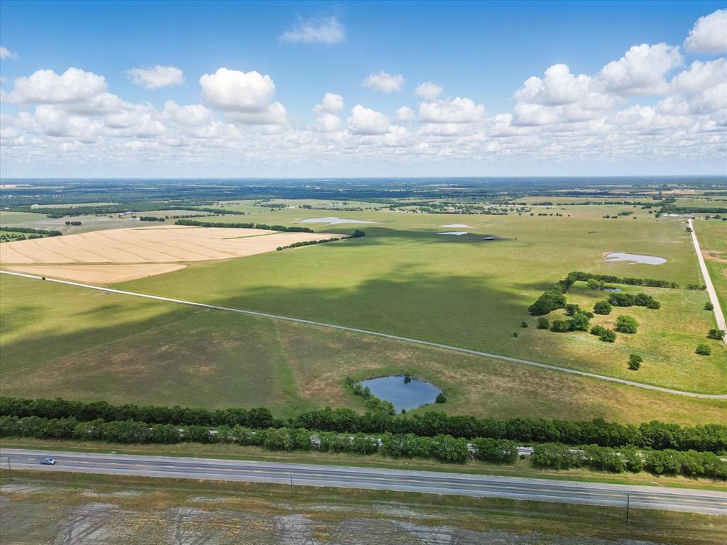 6482 County Road 1050 Celeste, TX 75423 - Photo 18 of 19 a view of an ocean and beach