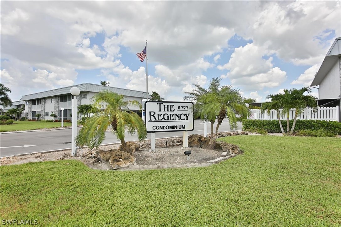 6777 Winkler Road, Unit 203 Fort Myers, FL 33919 - Photo 1 of 25 a view of outdoor space with garden and entertaining space