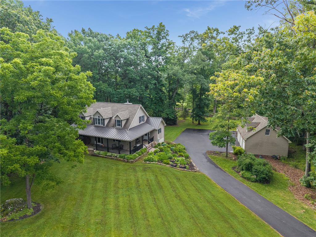 465 Raubsville Road Easton, PA 18042 - Photo 2 of 60 A private wooded setting surrounds this charming home with a separate garage and extended driveway.