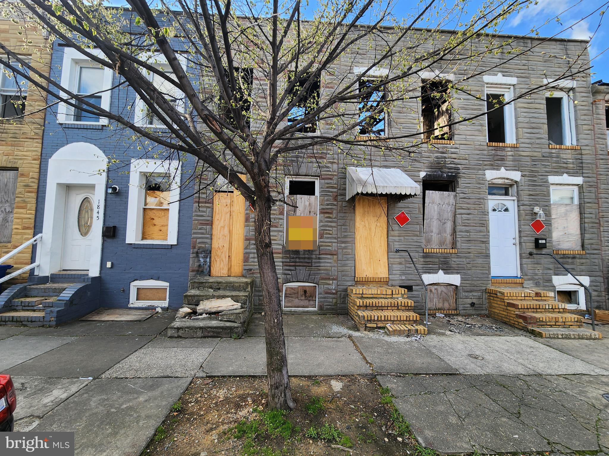 1847 Ramsay Street Baltimore, MD 21223 - Photo 3 of 5 a front view of multiple houses