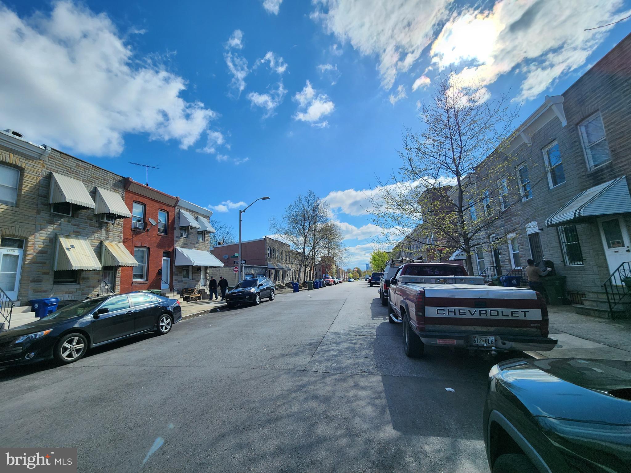 1847 Ramsay Street Baltimore, MD 21223 - Photo 5 of 5 a view of a cars park in front of a building
