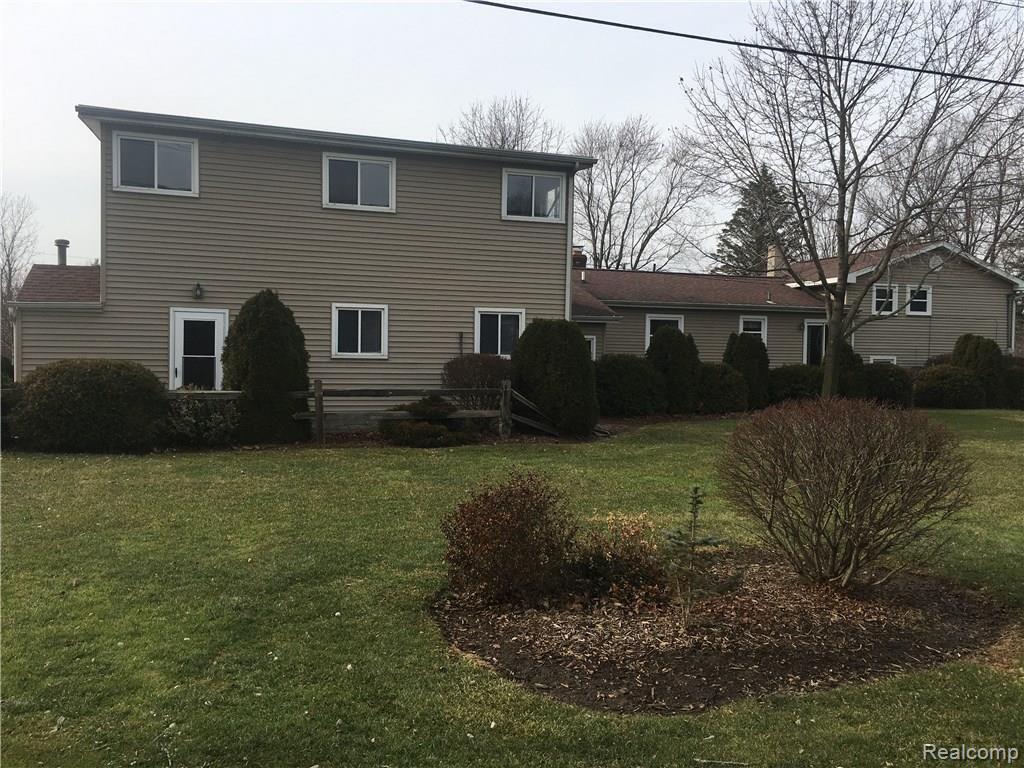 24071 Waltz Road New Boston, MI 48164 - Photo 3 of 35 Back of home