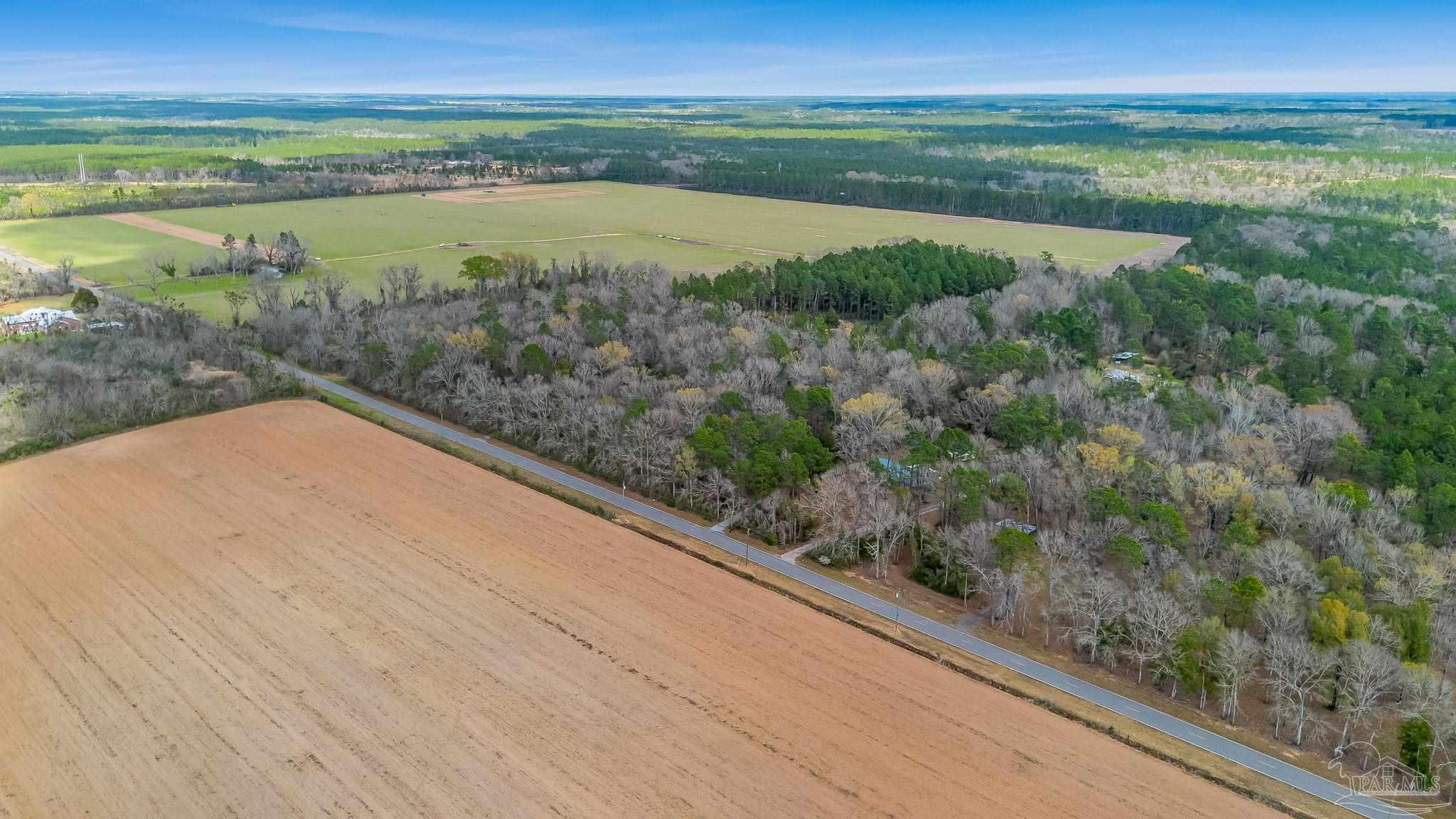 7900 Enon School Road McDavid, FL 32568 - Photo 4 of 27 a view of mountain with lake view