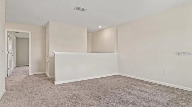an empty room with an entryway