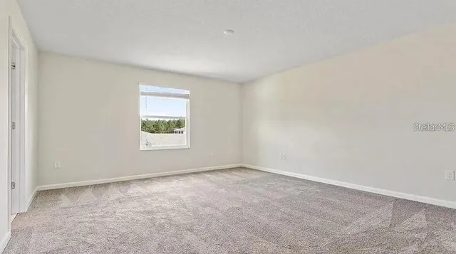 an empty room with a window