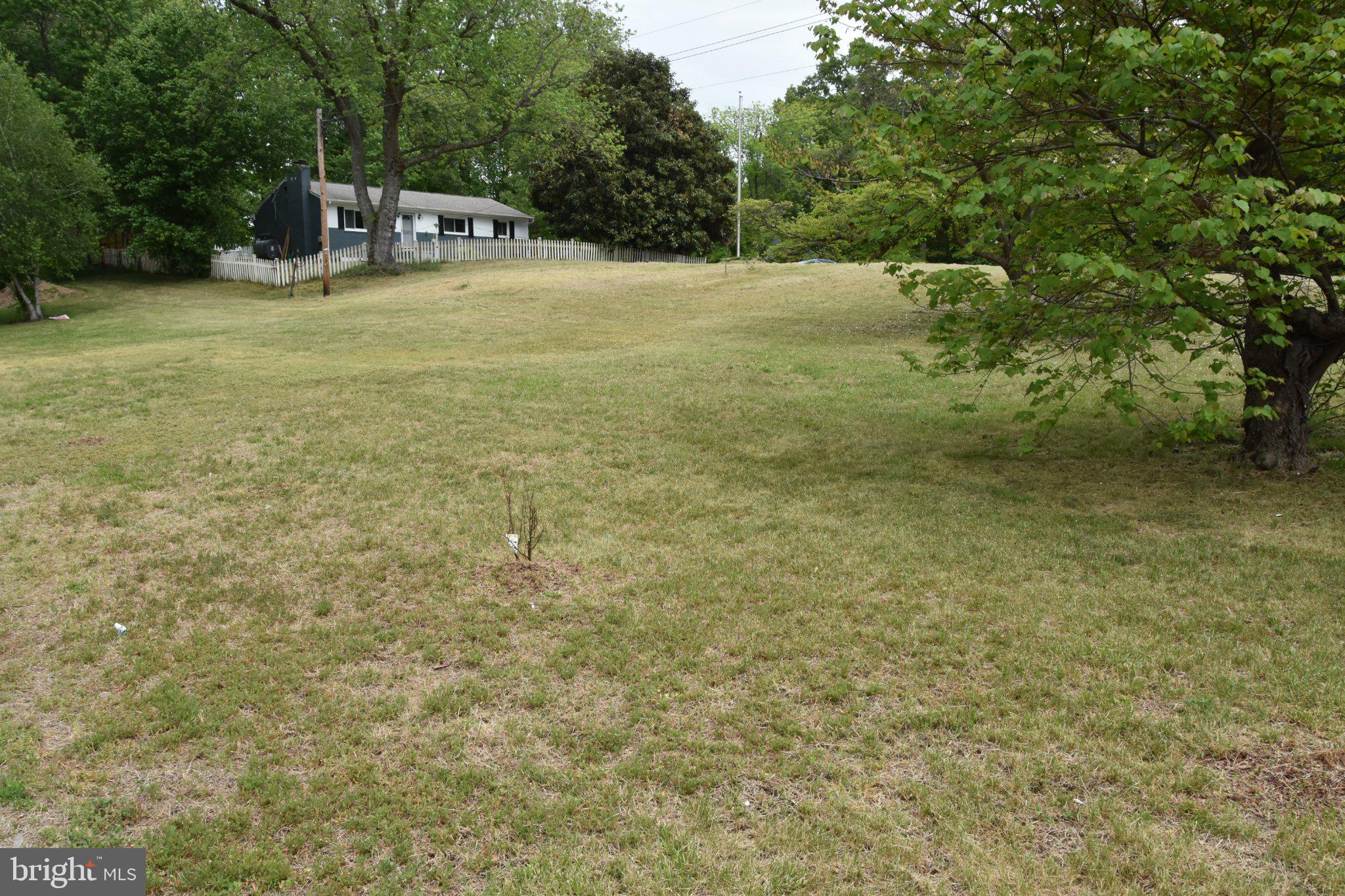 8610 Croom Road Upper Marlboro, MD 20772 - Photo 4 of 14 a view of a outdoor space and a yard