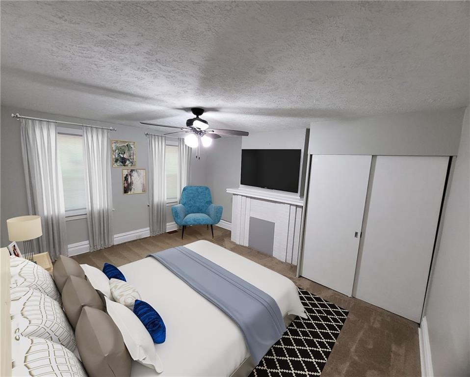 279 Nelson Run Road Pittsburgh, PA 15237 - Photo 24 of 38 a bedroom with a bed and a flat screen tv